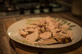 grilled pieces of chicken meat on plate