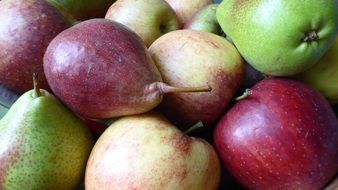 Colorful ripe pears and apples