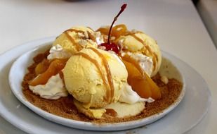 ice cream, mango and caramel, dessert on plate