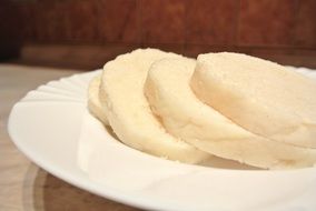 large dumplings in a white plate