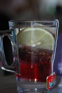 tea with lemon in a transparent cup