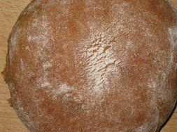 farmers bread on a wooden surface