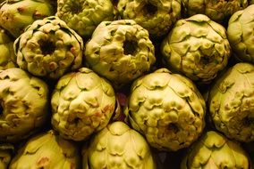 Green artichokes in a pile