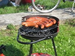 grilled sausages in the open air