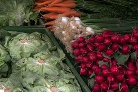 vegetables on the counter of the vegetable market