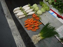 counter with vegetables at the market
