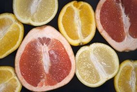 cut orange, grapefruit and pomelo