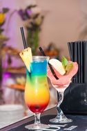 colored alcohol cocktail in a glass