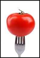 red tomato on a fork