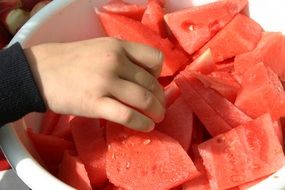 Close-up of the picking watermelon slices