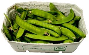 raw sugar peas in paper box
