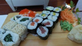 sushi on a wooden board