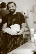 chef, mature man at work in restaurant