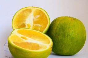 cut lime, green citrus fruits