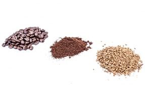 heaps of coffee beans, instant coffe and ground coffee