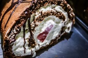 Chocolate roll with whipped cream