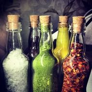 colorful bottles with salt coffee mustard