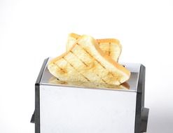 two slices of toasts popping upthe toaster