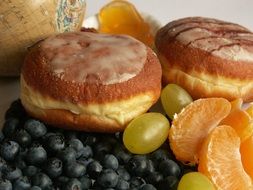 sweet donuts and fruits