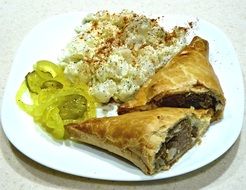 pastry on a plate with food