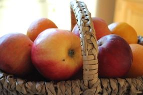 fresh ripe apple fruit in basket