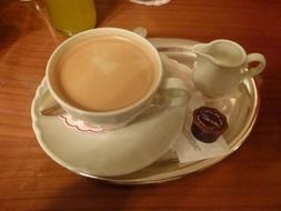 coffee with milk on a tray for breakfast