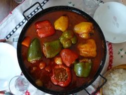 Stuffed peppers in red sauce, Hungarian cuisine