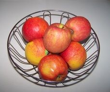 apples in the fruit metal bowl