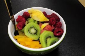 fruit salad in a white plate