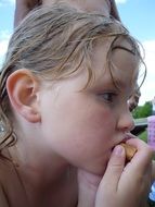 eating child girl portrait