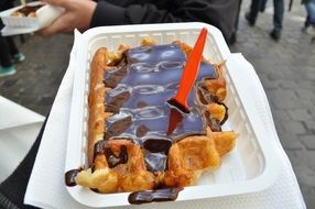 waffles with chocolate for sale on the street