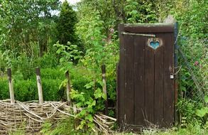 garden gate wooden fence with heart hole