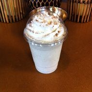 coffee with cream in a plastic cup