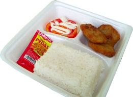 lunch box with rice and nuggets