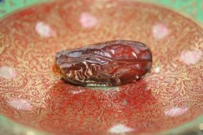 oriental food on vintage plate close-up