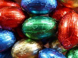 Shiny colorful Easter sweets in the form of eggs