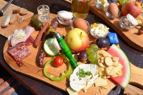 Lots of food on a wooden board