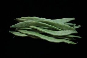 Green beans in a dark