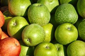 crop of green and red apples