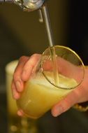 filling a glass of beer Stella Artois