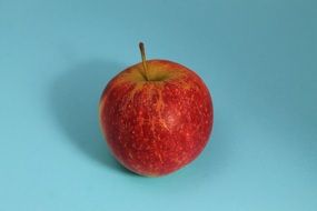 Apple on the blue table