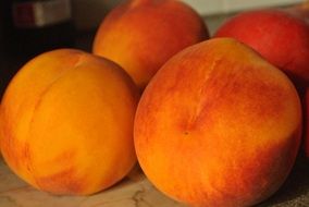 orange peaches on a plate