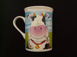 cup coffee with cow