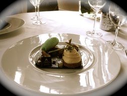 gourmet dessert on a white plate
