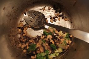 Salad made of the beans and broccolies