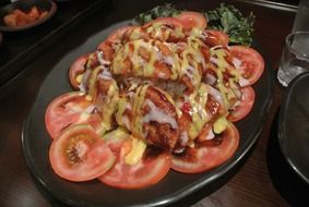 Dish made of tomatoes and meat