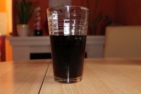 a glass of cola drink