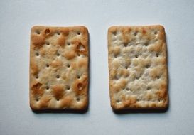 two biscuits on white surface