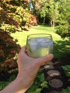 drink with ice in hand