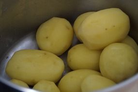 fresh pilled potatoes in a pot